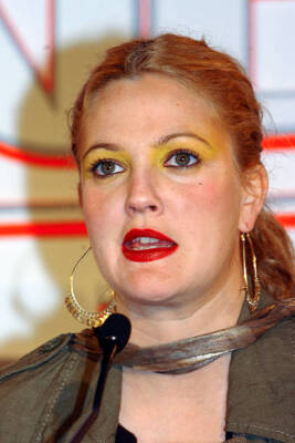 Actress Drew Barrymore attends a press conference to promote her l- Old Photo 5