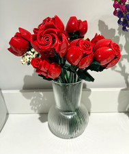 Artificial Red Rose Flower Arrangement  Centerpiece in Ribbed Clear Glass Vase