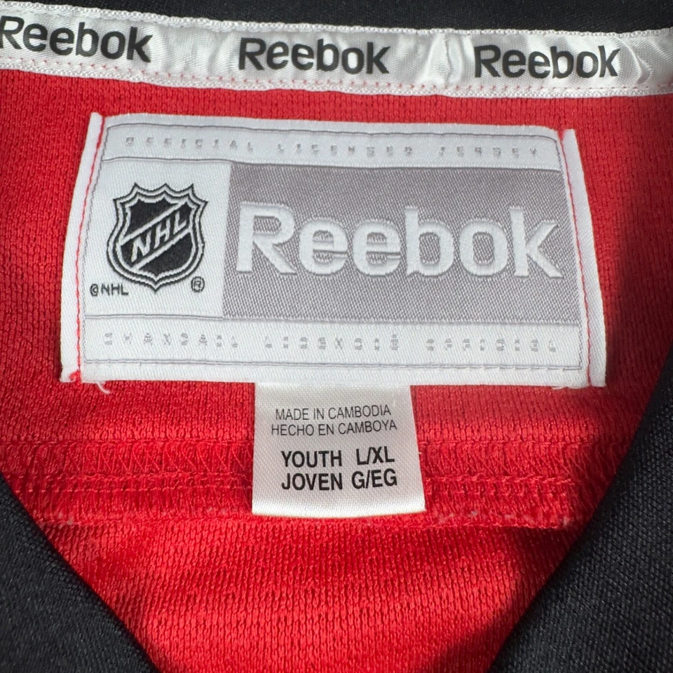 Camiseta deportiva de hockey Reebok talla juvenil L/XL NHL Chicago Blackhawks Jonathan Toews #19 Foto 3 de 4