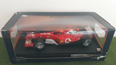 F1 FERRARI F2003 GA M. SCHUMACHER SPONSOR MARLBORO au 1/18 HOT
