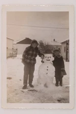 FOUND PHOTO Two Boys With A Snowman Christmas Snapshot Vtg 1940s