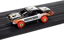 AUTO WORLD: 1963 BUICK RIVIERA  DAFFY DUCK LOONEY TUNES SLOT CAR RACER 1:64 NEW