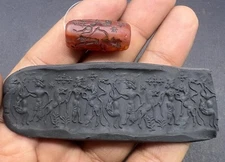 AUTHENTIC NEAR EASTERN PRECIOUS STONE CYLINDER SEAL WITH SUPERB FINE IMPRESSION.