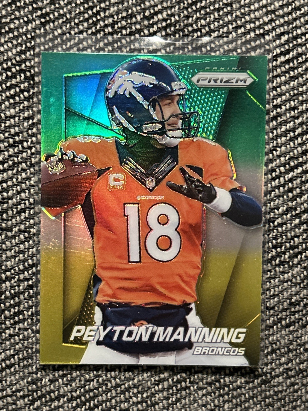 2014 Panini Prizm Neon Green & Yellow Prizm Peyton Manning #58