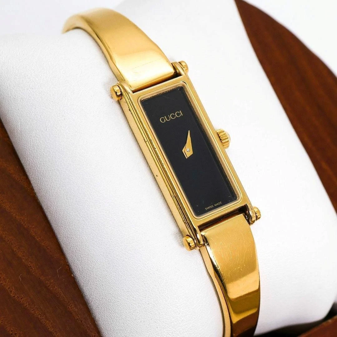 Montre Gucci 1500L Quartz Cadran Noir Bracelet Or État Fonctionne