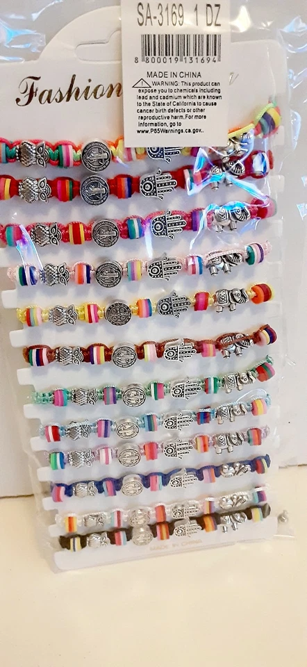 12 PULSERAS BAUTIZO RECUERDOS San Benito Elefante Mal de ojo mano Búho Foto 2 de 4