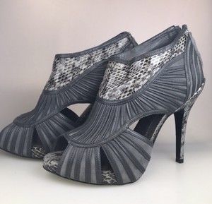 snakeskin peep toe booties