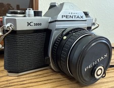 Nice Pentax K1000 35mm SLR Film Camera w/ 50mm 75-200 Lens Strap - Tested