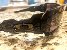 Oakley Men’s Wrap Sunglasses Black Plastic Frame Gray Mirrored Plastic Lens
