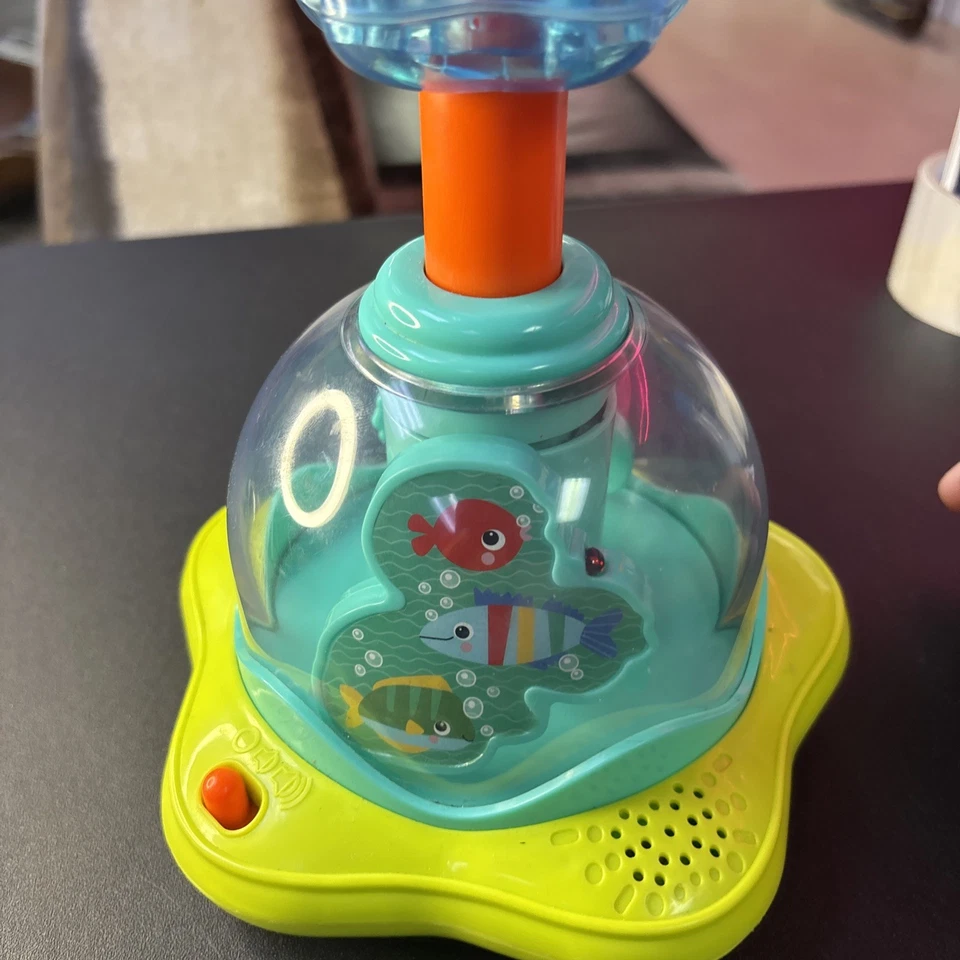 Bright Star Press & Glow Tropical Pez Spinner Juguete para Bebé con Luces y Sonidos Foto 4 de 4