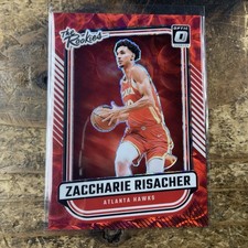 Zaccharie Risacher 2024-25 Optic The Rookies Red Intl Prizm + Topps Blackout