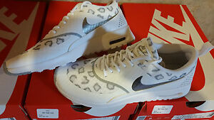 white leopard nike shoes