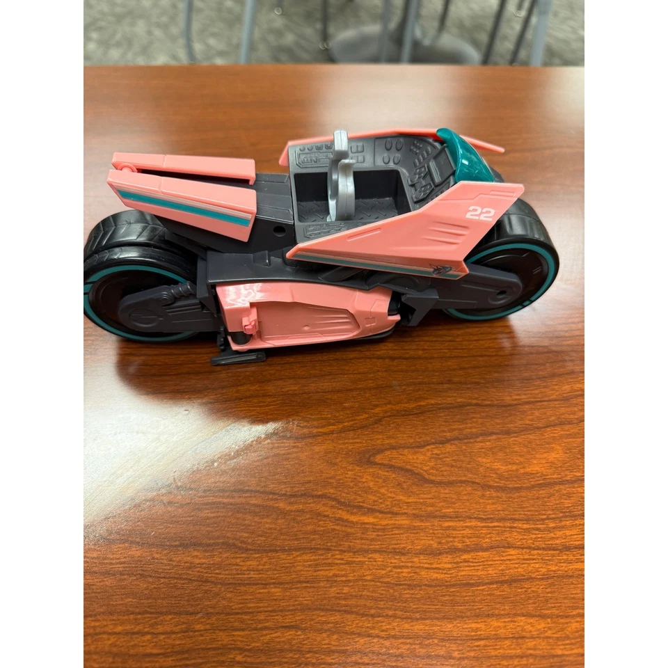 Vehículo de juguete futurista rosa verde azulado número 22 Foto 4 de 4