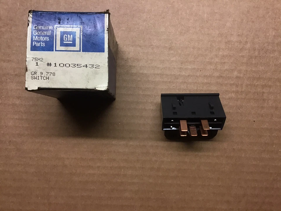 Pontiac 6000 1984-89 interruptor descongelador ventana trasera nuevo en stock Foto 3 de 3