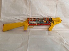 G - MAN MODEL TIN LITHOGRAPHED 23 INCH TOMMY TOY GUN 1950 s