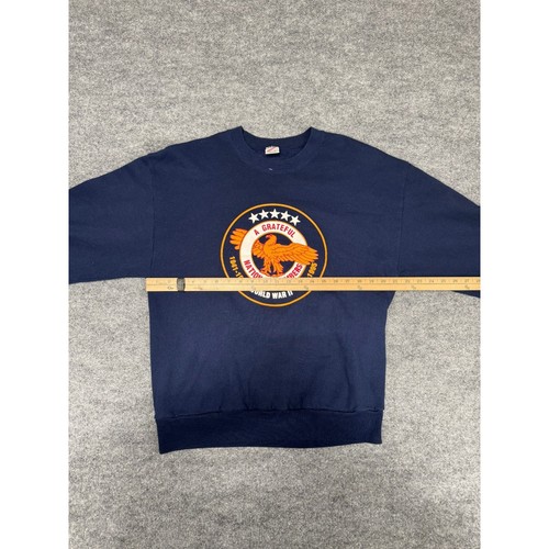 Navy VTG Jerzees sweatshirt with large orange eagle logo and stars on chest, white memorial text reads “World War II.”