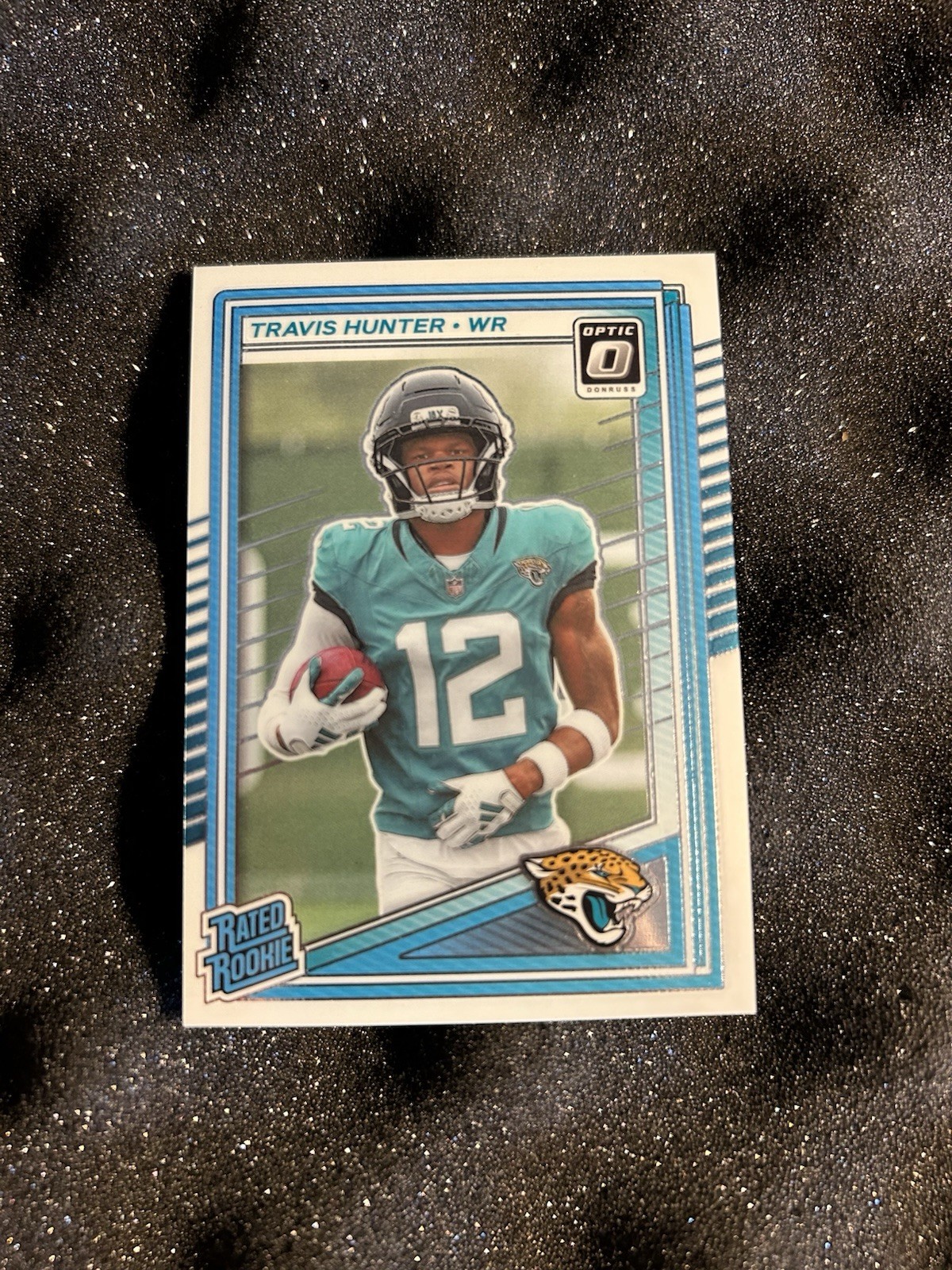 2025 Panini Donruss Optic holo Rated Rookie Prizm Travis Hunter Jaguars #201