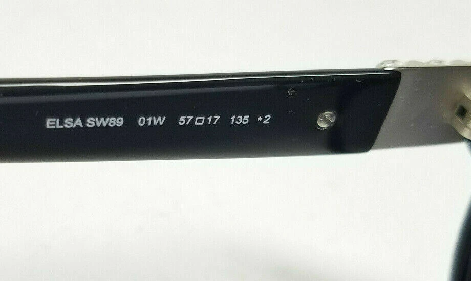 Очки солнцезащитные SWAROVSKI Elsa SW89 01W черные пластиковые 57-17-135 круглые с камнями   - Изображение 3 из 4