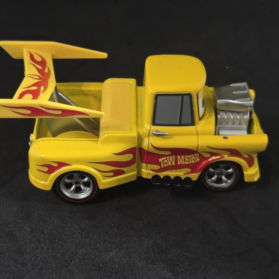 Disney Pixar Cars Funny Car Mater Loose Diecast Yellow Flames  - Image 3 of 4