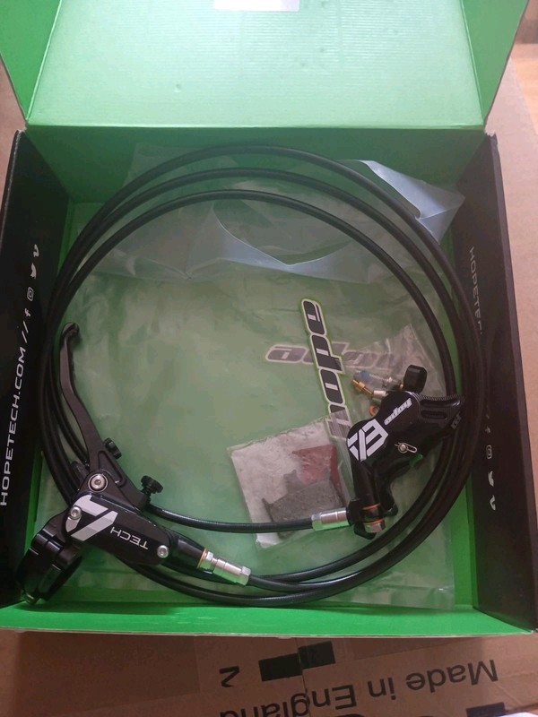 Hope Tech 4 E4 L/H Brake. Brand New, Full Length Hose, inc. all Accessories.