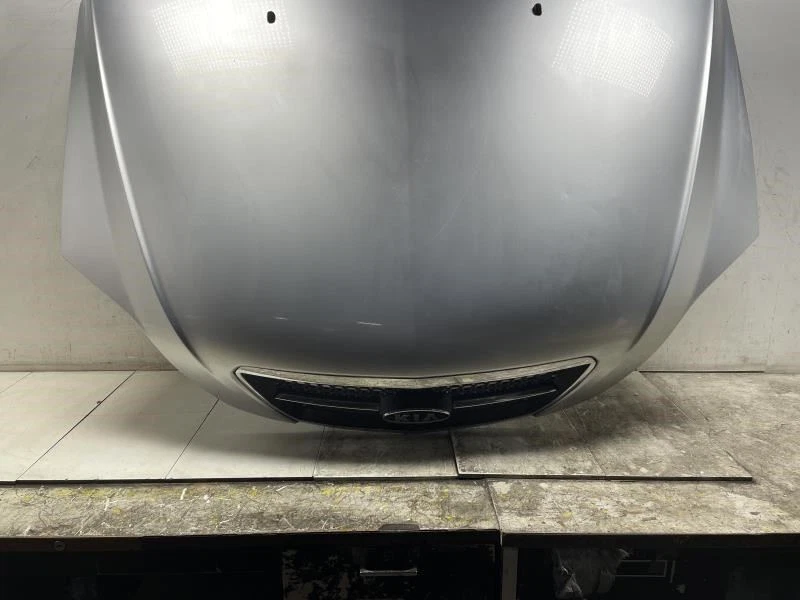 Kia Sorento LX 2006 capó OEM+ (plata transparente) Foto 3 de 4