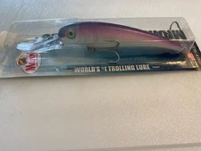 Mann's Stretch 25+ Niteglow pink and purple trolling Lures