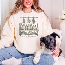 Apothecary Shelf with Herb Bundles and Tincture Bottles Sweatshirt