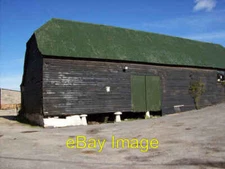 Photo 6x4 Quarley - Old Barn This barn is partly mounted on stone mushroo c2008