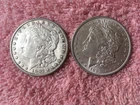 MORGAN SILVER DOLLAR COINS.  LOT OF 2  AU./ DETAILS PRE. 1921 LOT # 7-B
