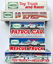 The Hess Toy Collector 1996 + 40th Anniversary Book AND 1991-95 Hess Trucks NIB