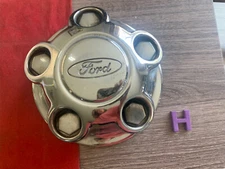 #H 1) 95-01  Ford Explorer Ranger Center Cap Hub  YL54-1A096-BA