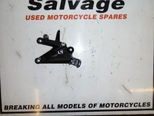 TRIUMPH STREET TRIPLE 675 R 2008 - 2012:FOOTREST HANGER - FRONT LEFT:USED 