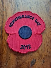 Remembrance Day poppy patch featuring the year 2012.