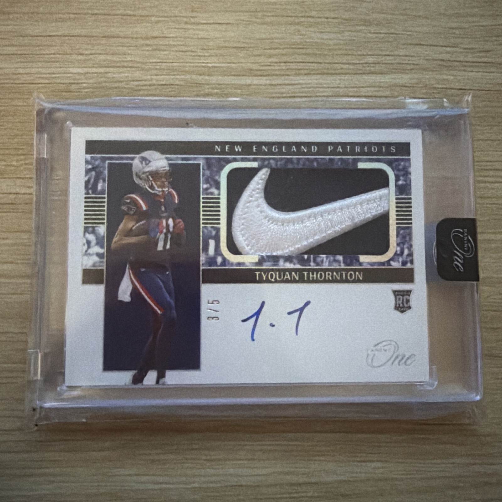 2022 Panini One Football Rookie Patch Auto Tyquan Thornton Nike swoosh #3/5 view 1