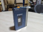 Vintage Sony TPS-L2 Walkman Cassette Player Blue lamp on with Case