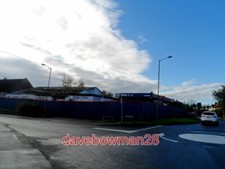 PHOTO FORMER CAR SALES LOT SEEMS TO BE UNDERGOING DEMOLITION. 2014