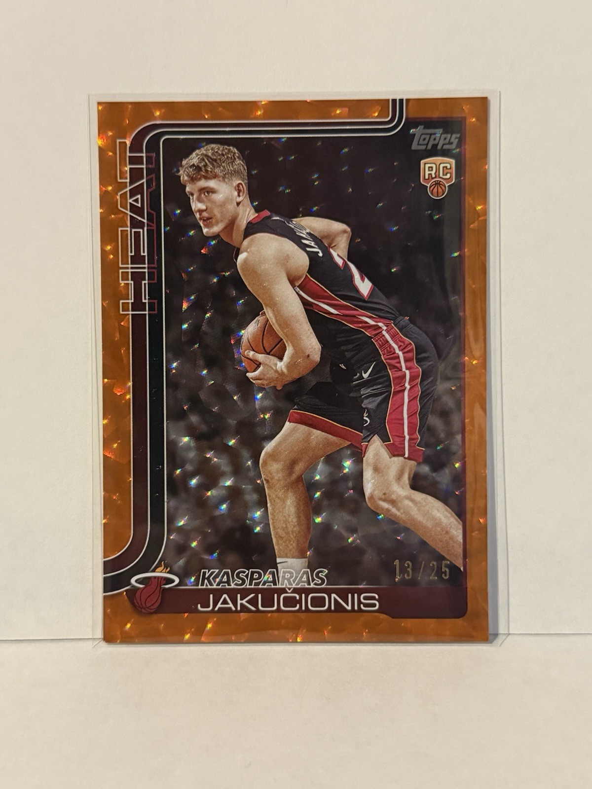 2025-26 Topps Kasparas Jakucionis #220 Orange Crackleboard Foil /25 (RC)