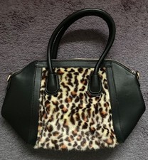 Ladies dark brown leopard print faux fur hand bag