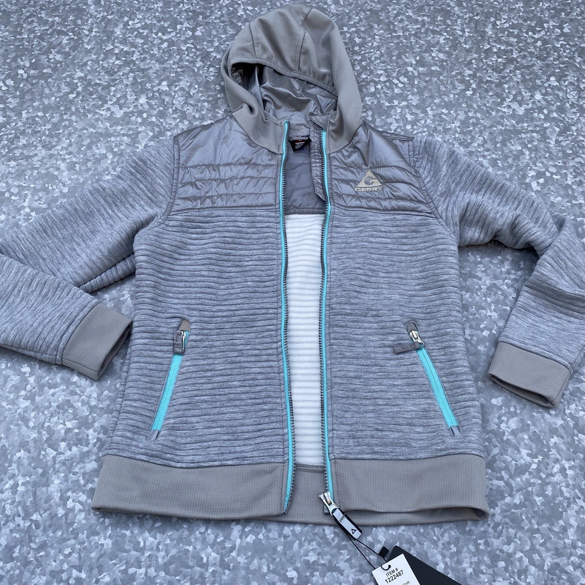 Coat with store thumb holes