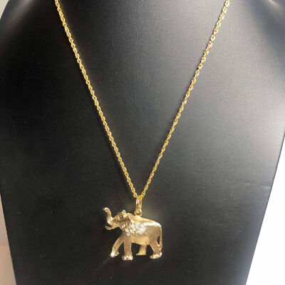 2031 Napier Elephant trunk up lucky gold tone pendant (with unbranded chain)
