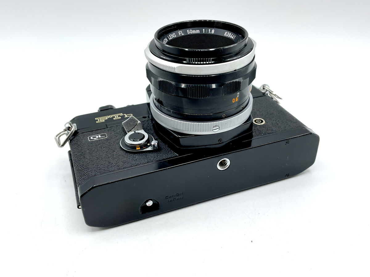Black Canon FTb-QL 35mm SLR Camera with 50mm f/1.8 FL Lens Black Canon FTb-QL 35mm SLR Camera with 50mm f/1.8 FL Lens