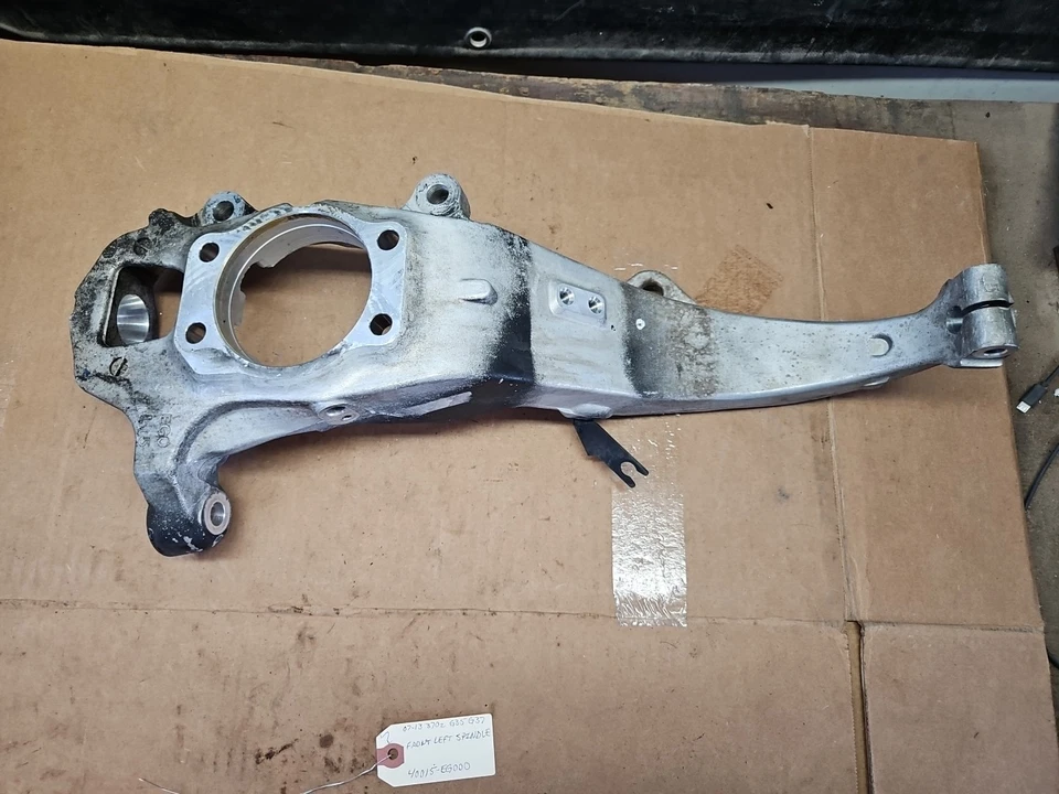 07-13 Nissan 370z Infiniti G35 G37 tracción trasera delantero izquierdo nudillo husillo 40015-EG000 Foto 2 de 4