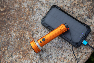 Olight Prowess Orange Flashlight/Cozy Lamp, 5000 Lumen, Forward