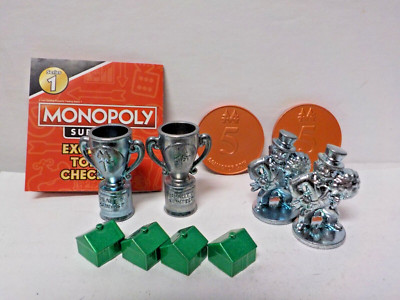 C0909 Hasbro Monopoly ''Surprise Metal Game Tokens'' Board Game Piece Lot
