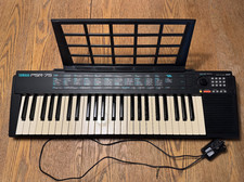 Yamaha Electronic Keyboard PSR-75 With Power Cable & Headphone adapter