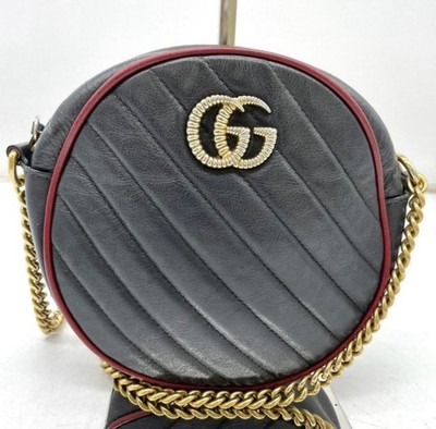 Gucci Umhängetasche rund Leder gesteppt schwarz/rot Kette gold Reißverschluss