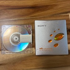 SONY MD WALKMAN Silver body and MD disc