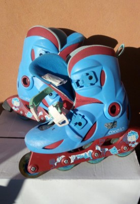 PATTINI A ROTELLE IN LINEA OXELO 32-34 CON PROTEZIONI