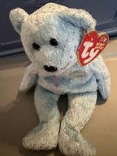 Ty Beanie Baby "Decade" Bear in light blue, released in 2003.