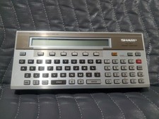 Vintage SHARP PC-1500 Pocket Computer Scientific Calculator POWERS ON, UNTESTED